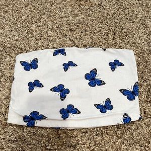 White, blue, and black butterfly crop top
